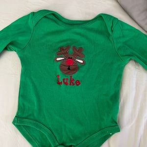 Green bodysuit with Luke and a reindeer